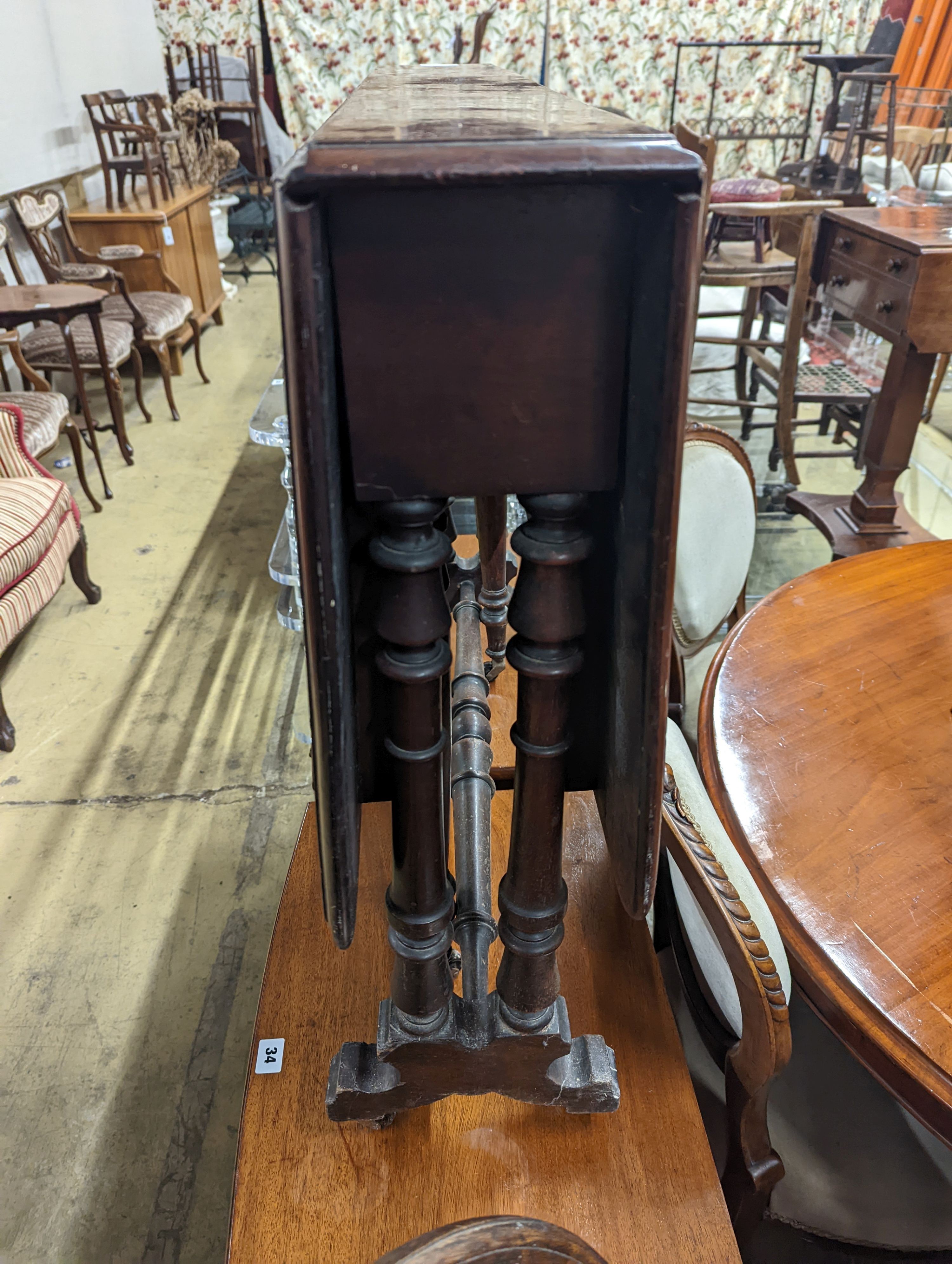 A Victorian mahogany Sutherland table, width 88cm, depth 16cm, height 74cm